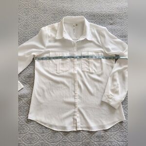 Long sleeve creamy white button down blouse with option for rolled sleeve L